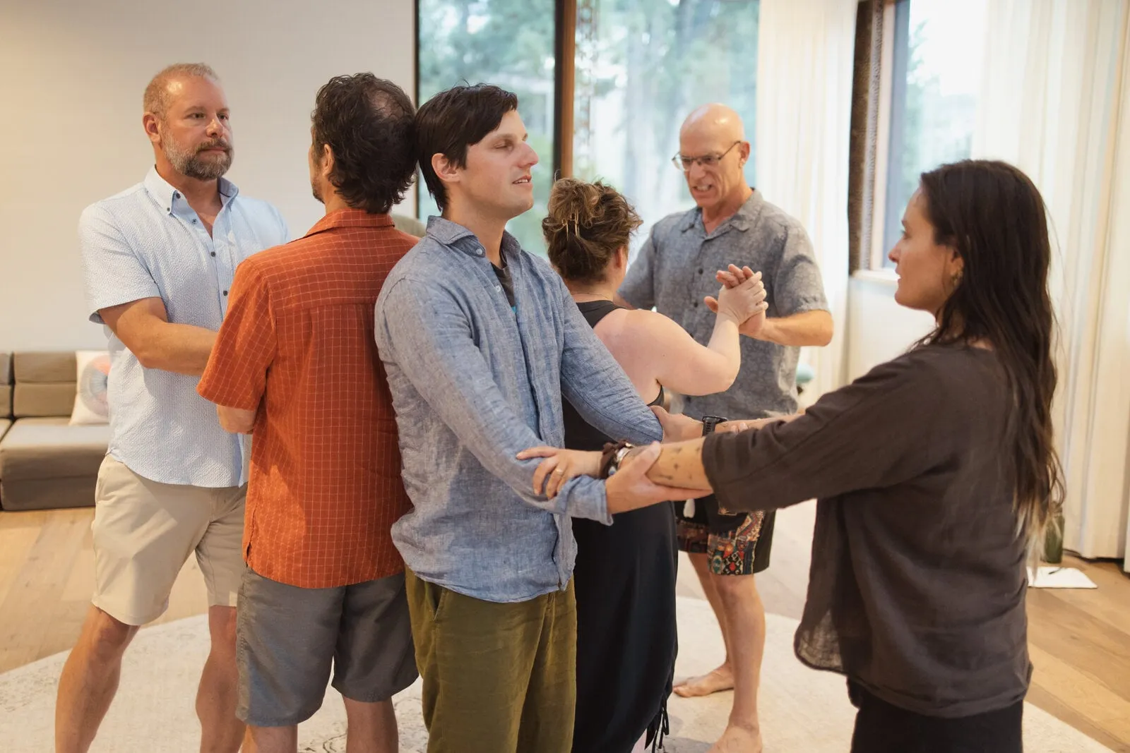 Pairs from the founding cohort standing in the dyad practice